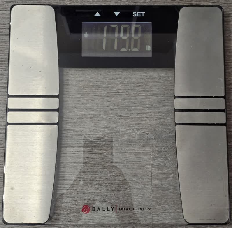The scale on the morning of day 44 reading 179.8 pounds